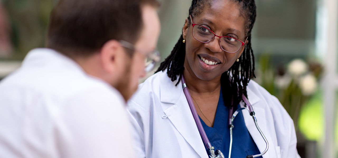 doctors meeting to discuss care coordination
