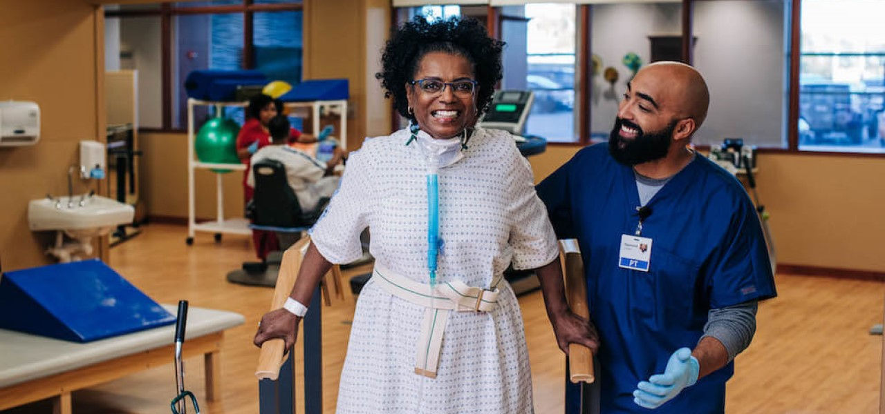 happy patient doing physical therapy