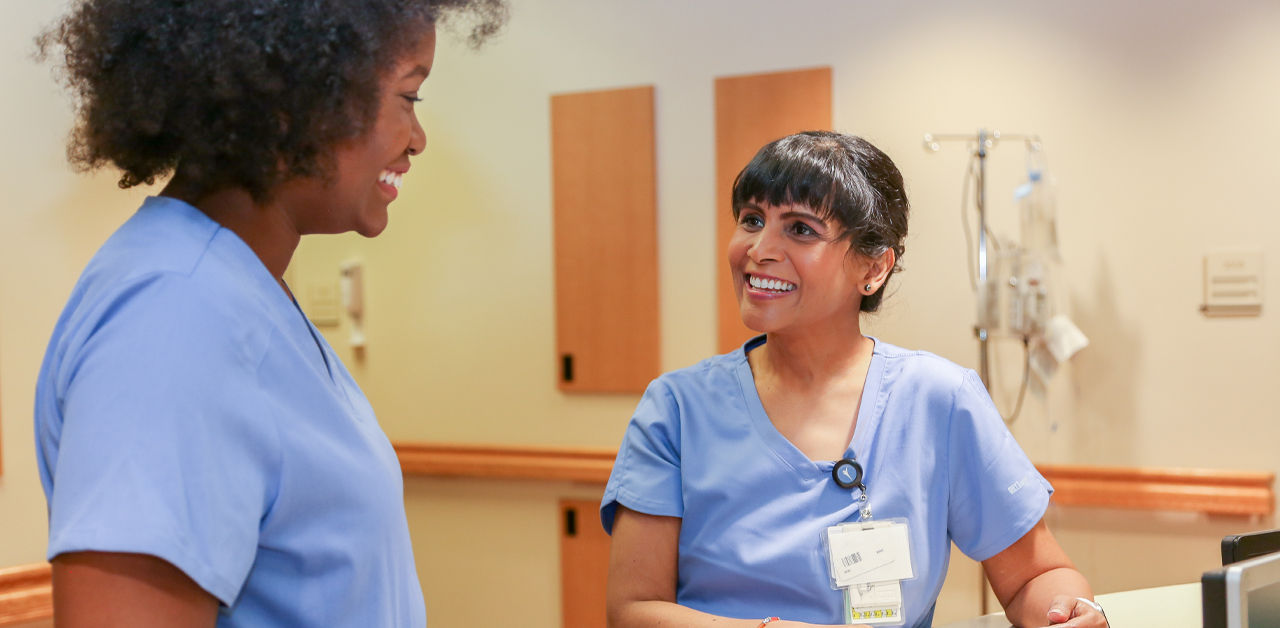nurses smiling talking news