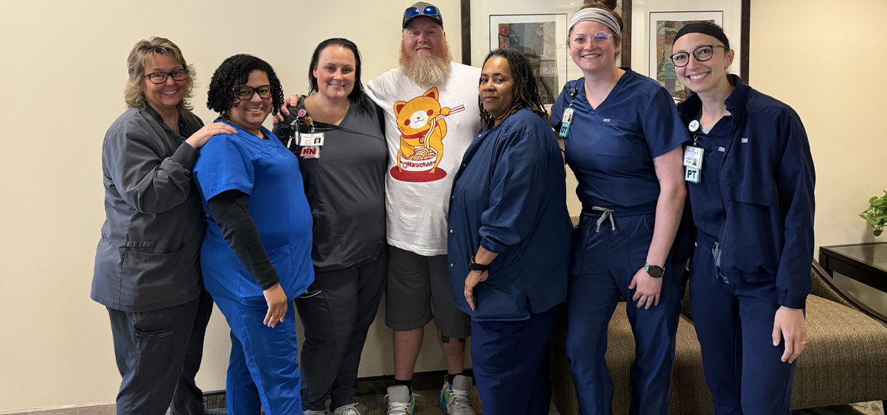 Happy patient with caregivers