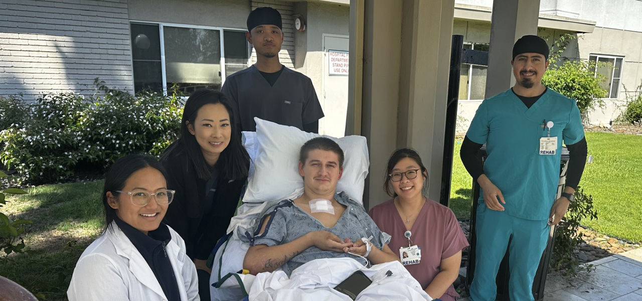 Kindred Hospital Los Angeles patient Benjamin poses with his care team
