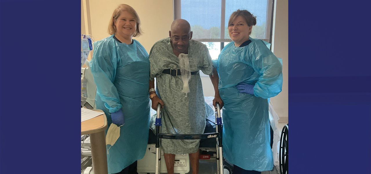 Kindred Hospital St. Louis South patient Bernard poses with his care team