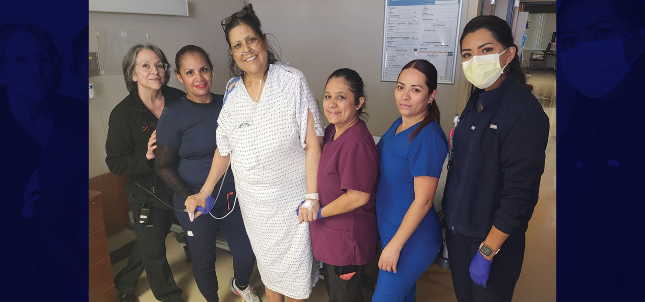 Kindred Hospital El Paso patient Beth stands with her care team
