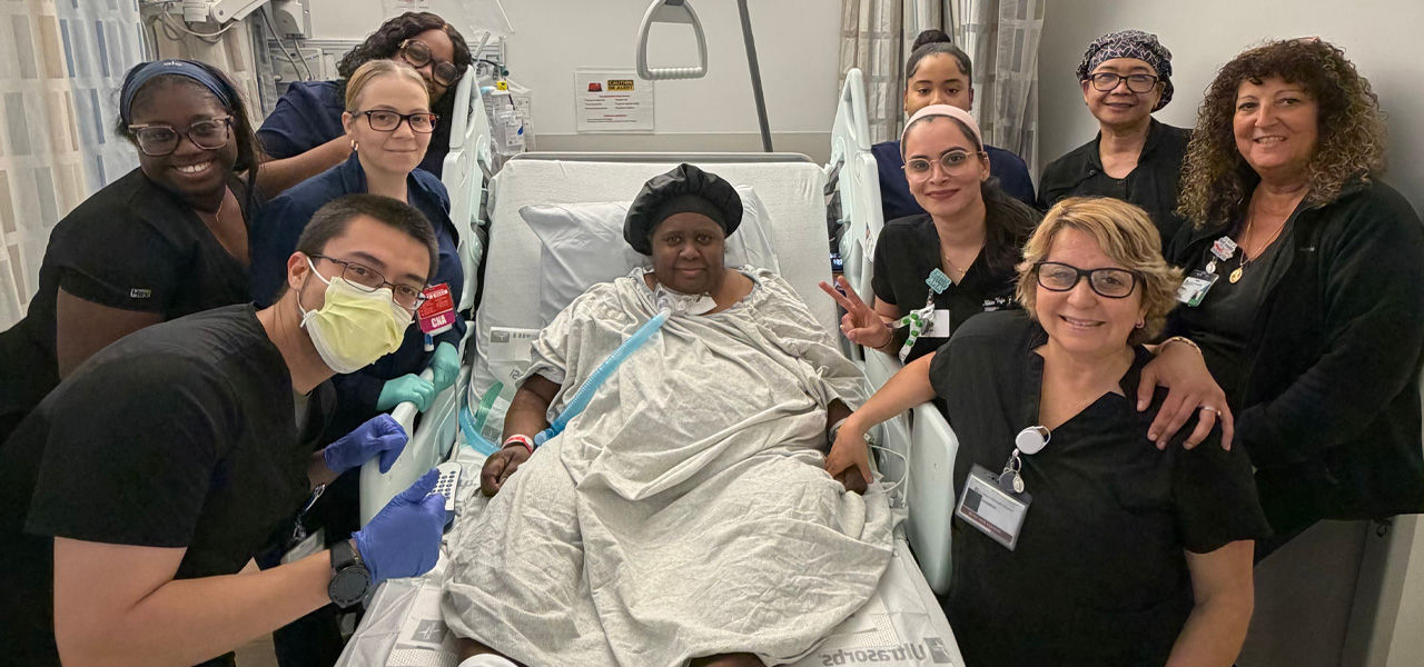 Kindred Hospital East New Jersey patient Beverly poses with her care team