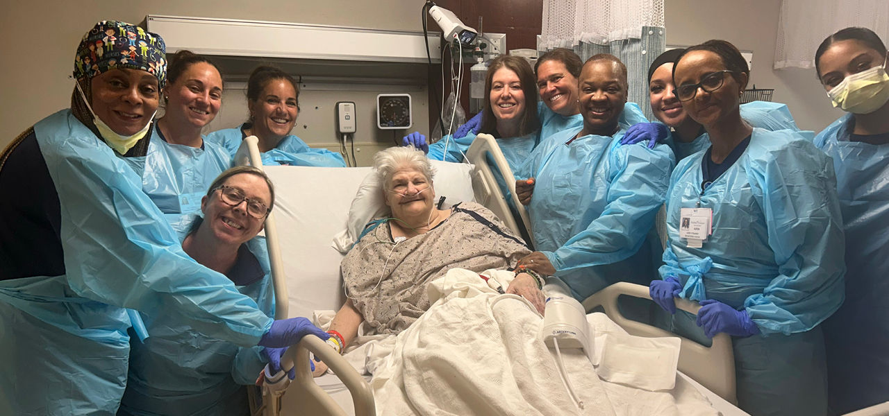 Kindred Hospital Philadelphia - Havertown patient Charlotte poses with her care team.