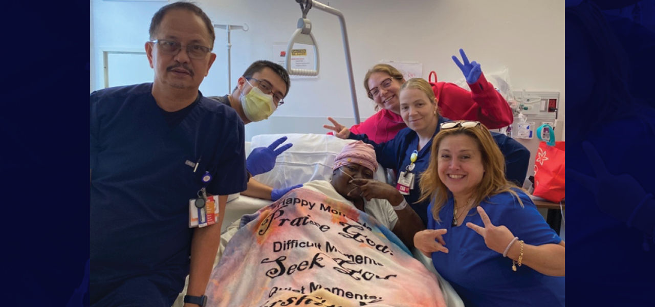 Kindred Hospital East New Jersey patient Charlotte poses with her care team
