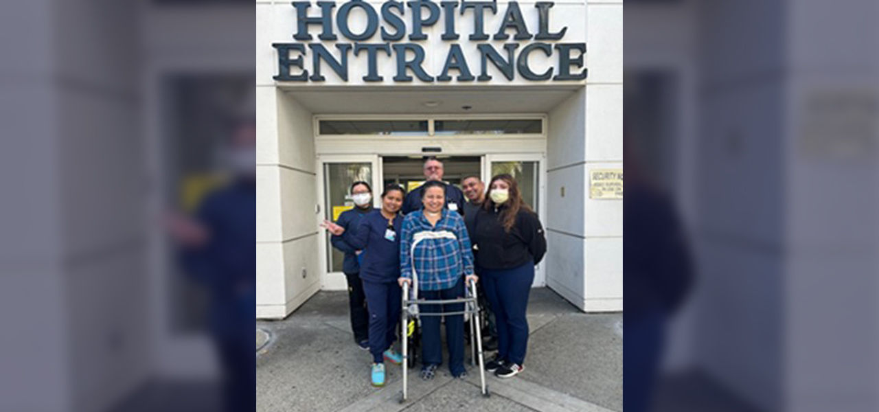 Happy patient leaving hospital with walker