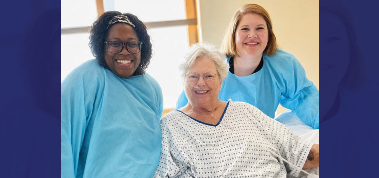 Kindred Hospital St. Louis South patient Connieann poses with her care team