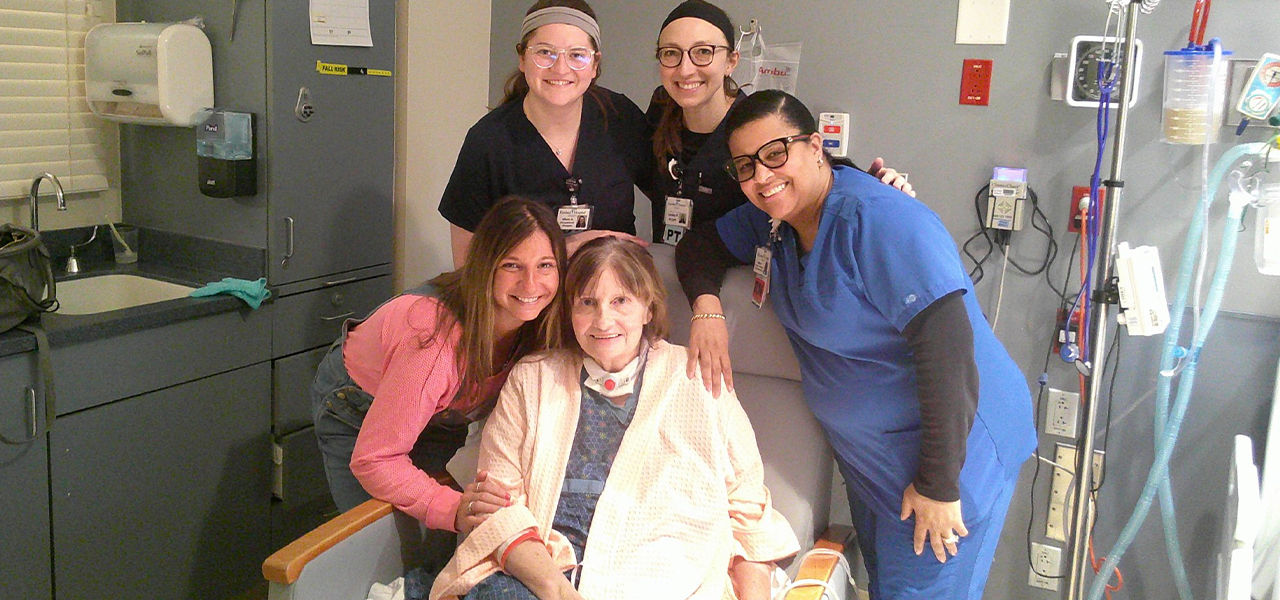 Happy patient with caregivers
