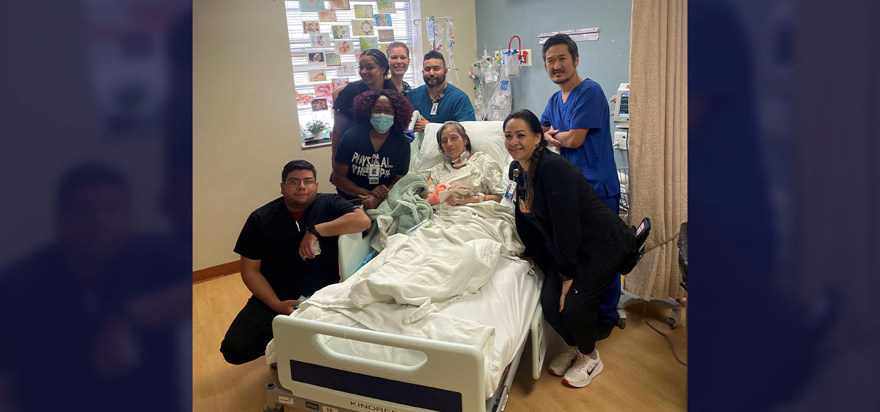 Happy patient leaving hospital with caregivers