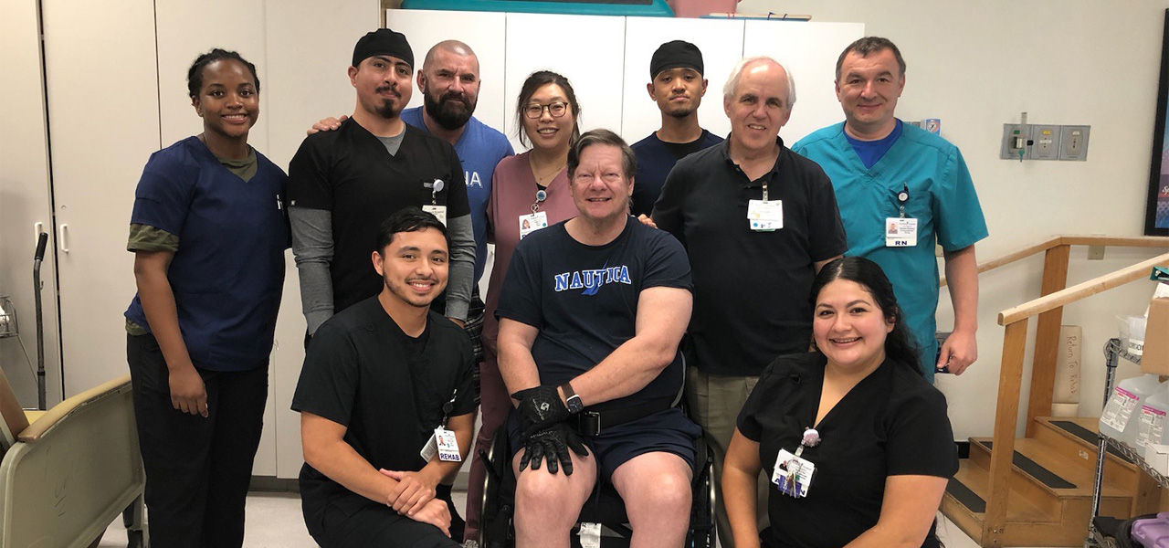 Kindred Hospital Los Angeles patient Douglas poses with his care team