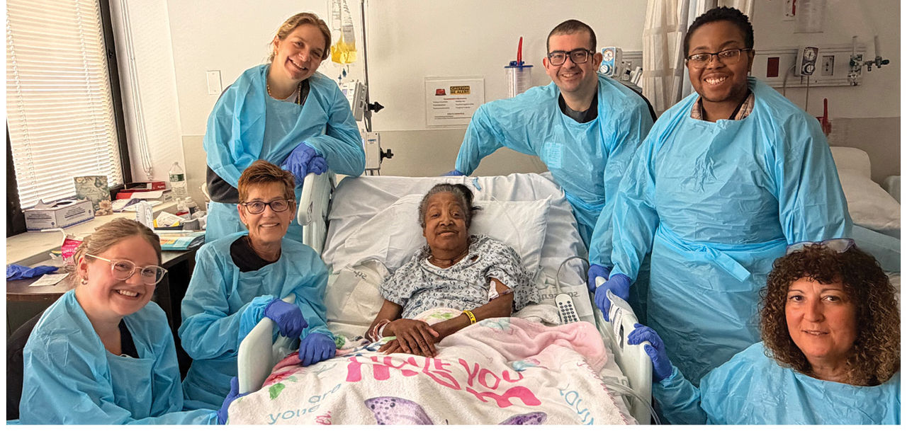 Kindred Hospital East New Jersey patient Earnestine poses with her care team