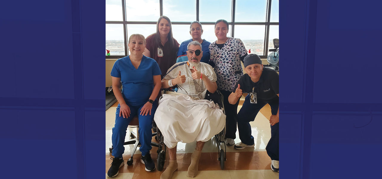 Kindred Hospital El Paso patient Ernesto poses with his care team