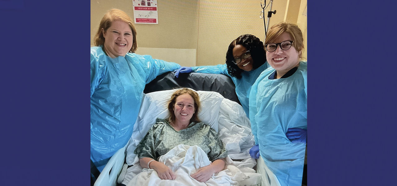 Kindred Hospital St Louis South patient Esther poses with her care team