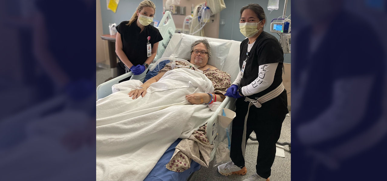 Happy patient leaving hospital with caregivers