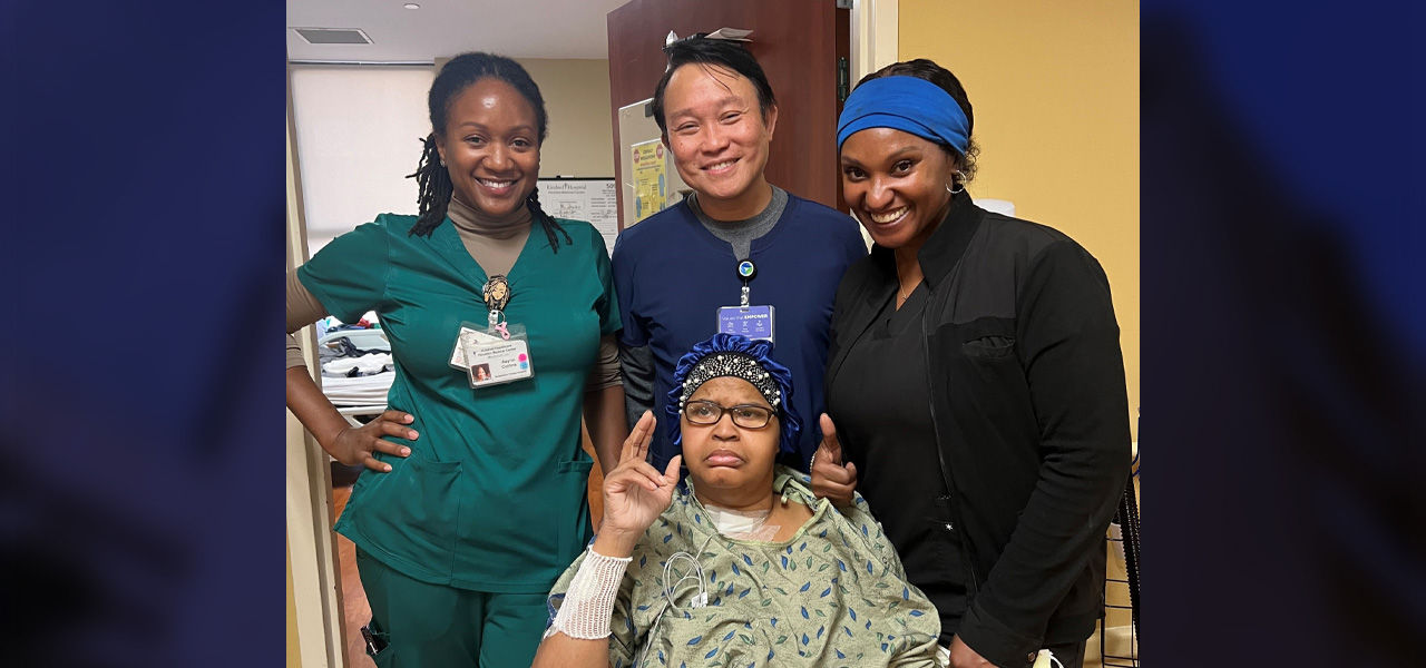 Kindred Hospital Houston Medical Center patient Jacqueline poses with her care team