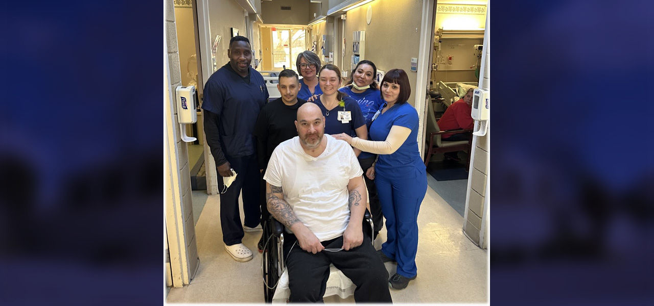 Kindred Hospital Albuquerque patient James poses with his caregiver team