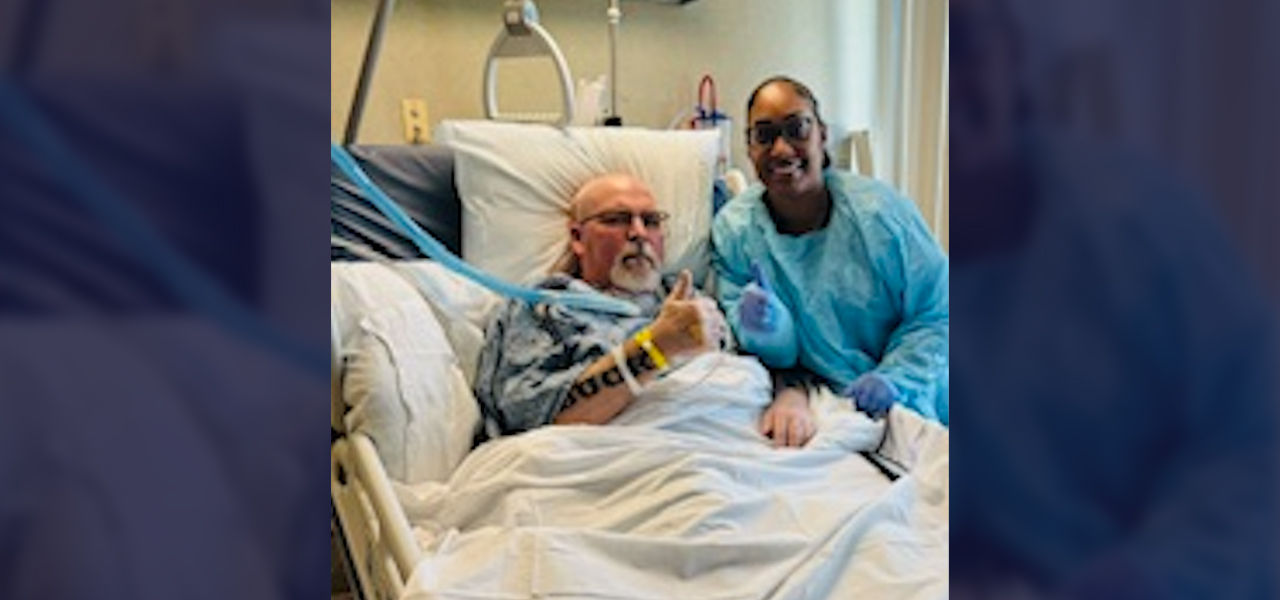 Happy patient leaving hospital with caregivers