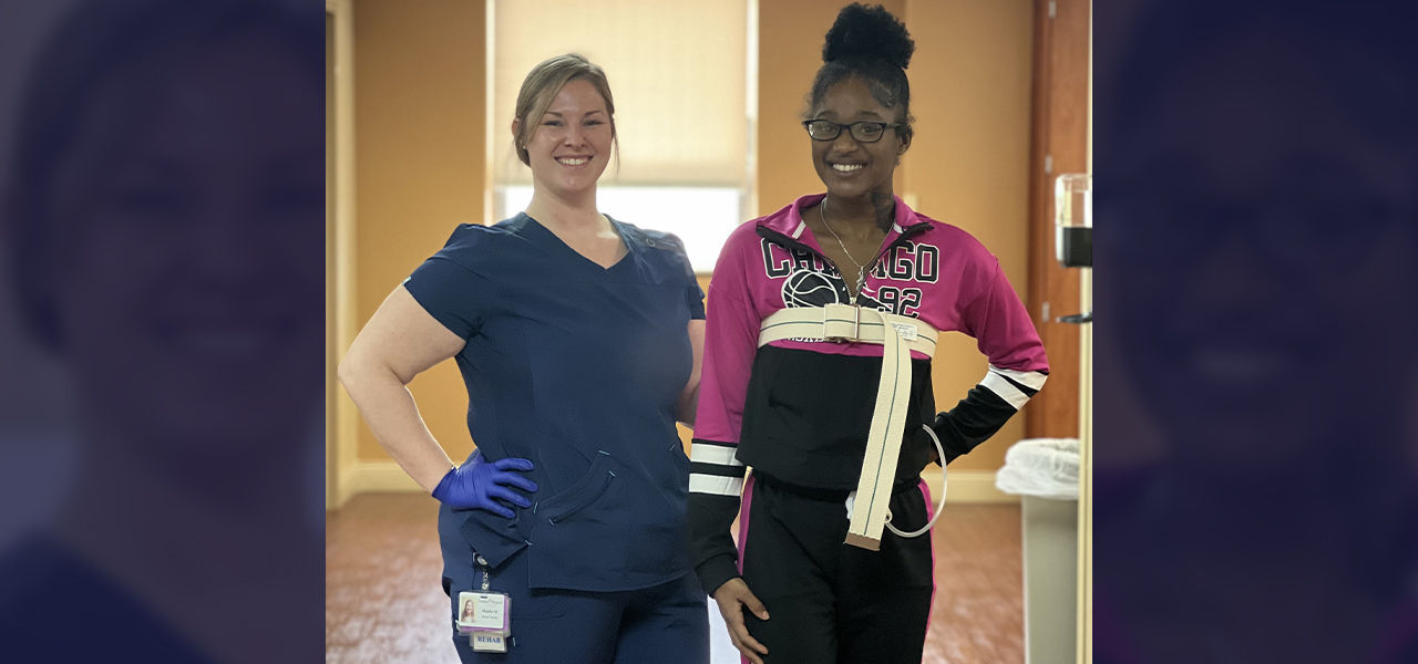 Kindred Hospital Louisville patient Jariah stands with her caregiver and shares her success story