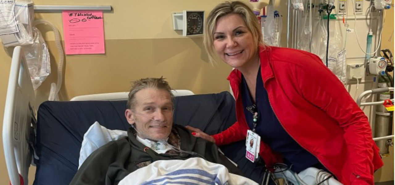 Happy patient leaving hospital with caregivers