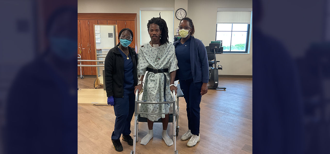 Kindred Hospital The Palm Beaches patient Jean poses with his care team