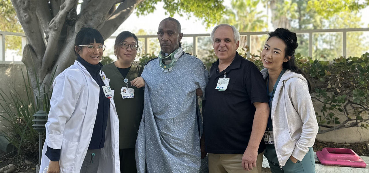 Kindred Hospital Los Angeles patient Jesse poses with his care team