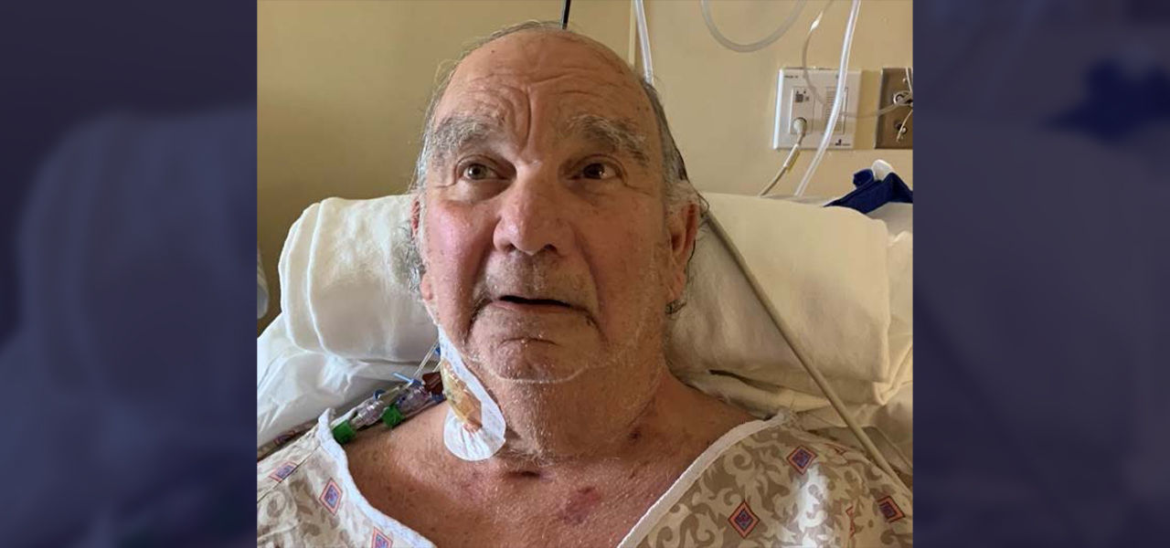 Happy patient leaving hospital with caregivers