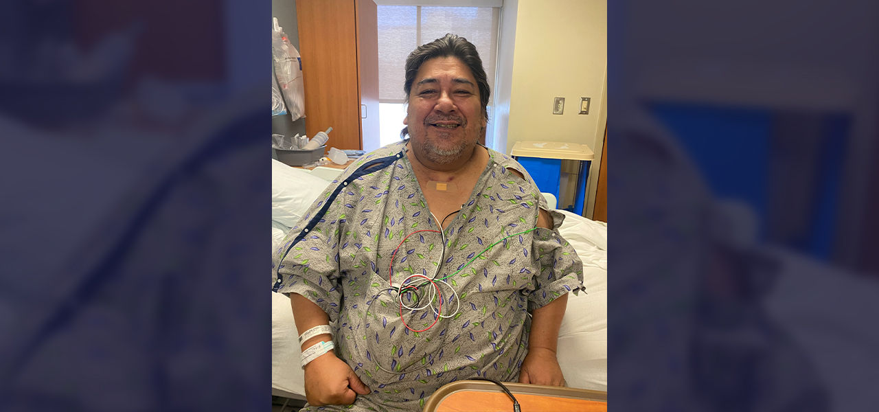 Happy patient leaving hospital with caregivers