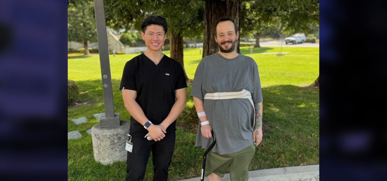 Kindred Hospital San Francisco Bay Area patient Joseph stands with his caregiver