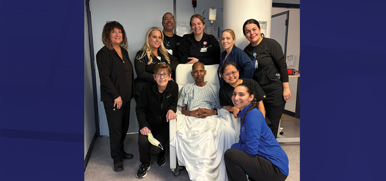 Kindred Hospital East New Jersey patient Kirt poses with his care team