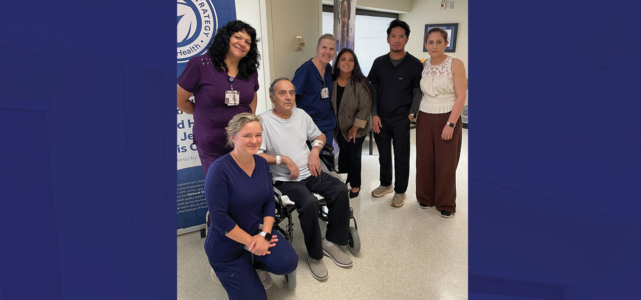 Kindred Hospital New Jersey Morris County patient Kujtim poses with his care team and shares his story of recovery