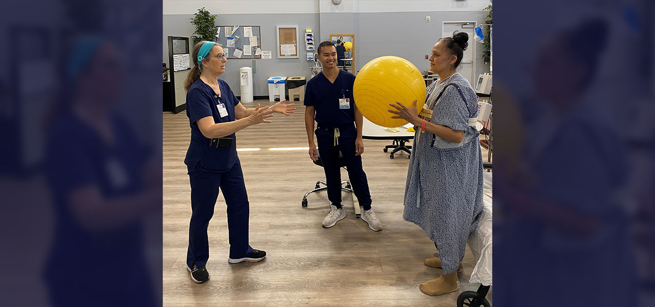 Patient doing physical therapy with caregivers
