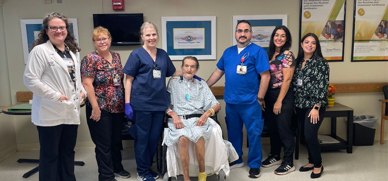 Kindred Hospital Morris County patient Lawrence poses with his care team
