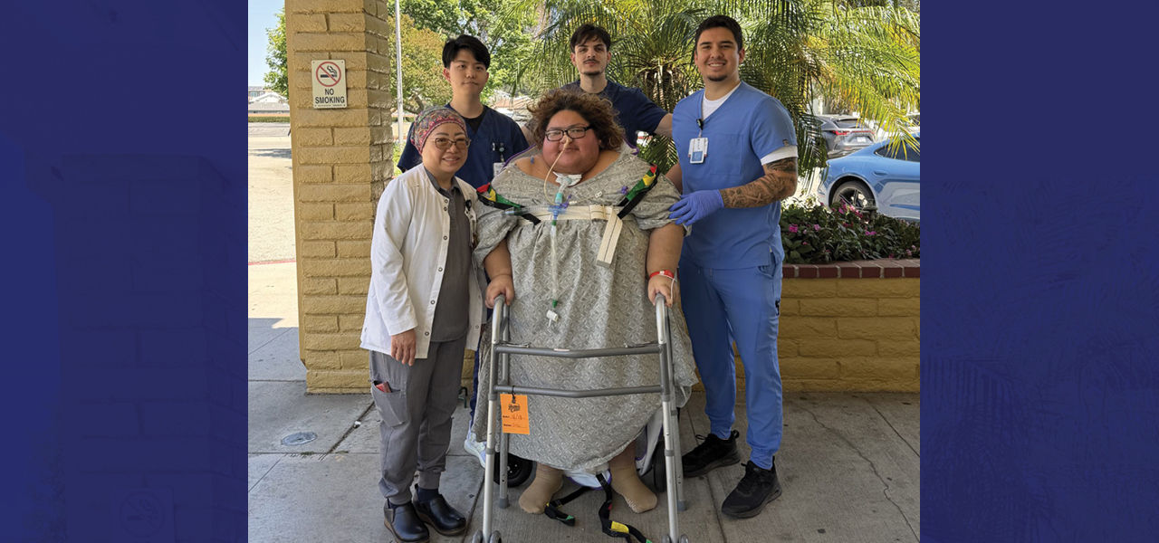 Kindred Hospital San Gabriel Valley patient Lurdes stands with her care team