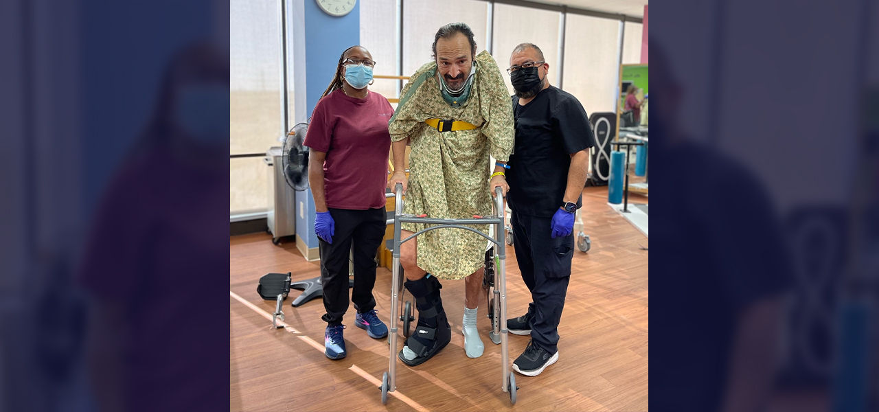 Happy patient leaving hospital with caregivers