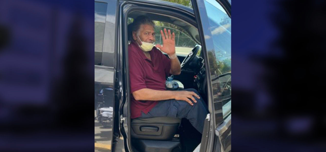 Kindred Hospital San Francisco Bay Area patient Michael celebrates his successful patient journey with a wave goodbye as he leaves the hospital in his truck