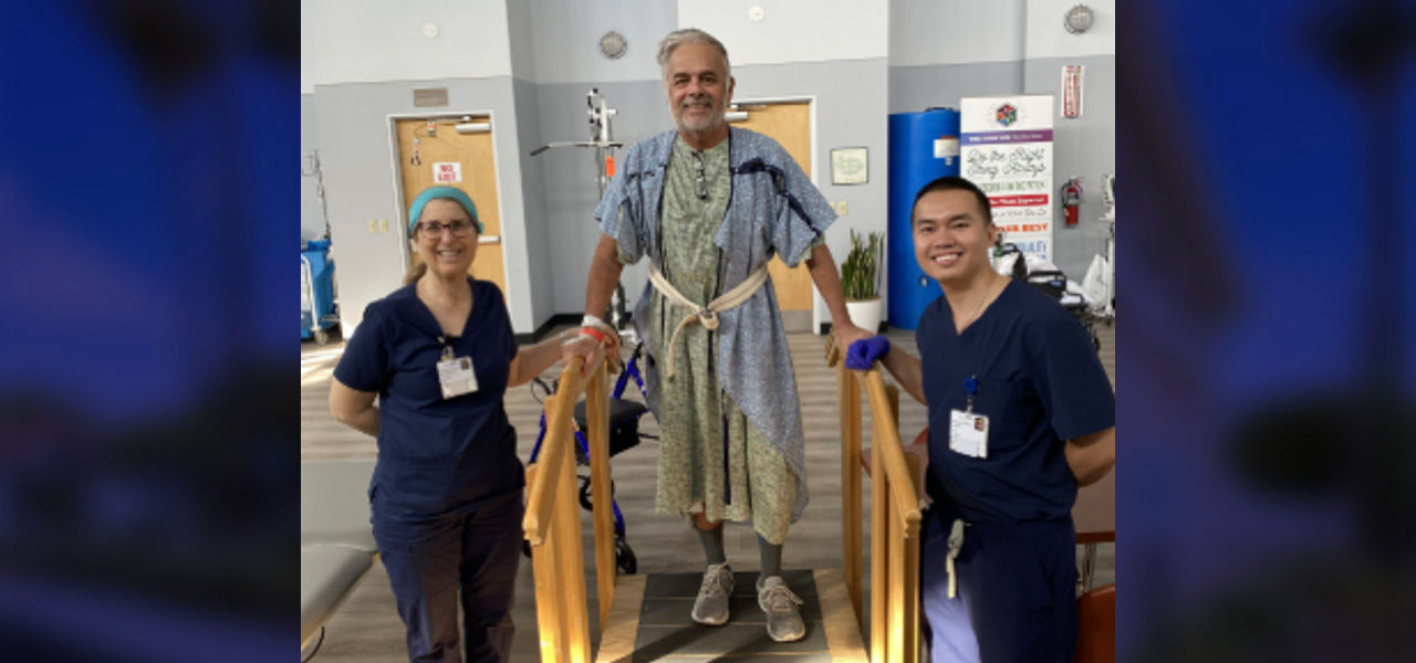 Kindred Hospital Brea patient Miguel poses with his care team