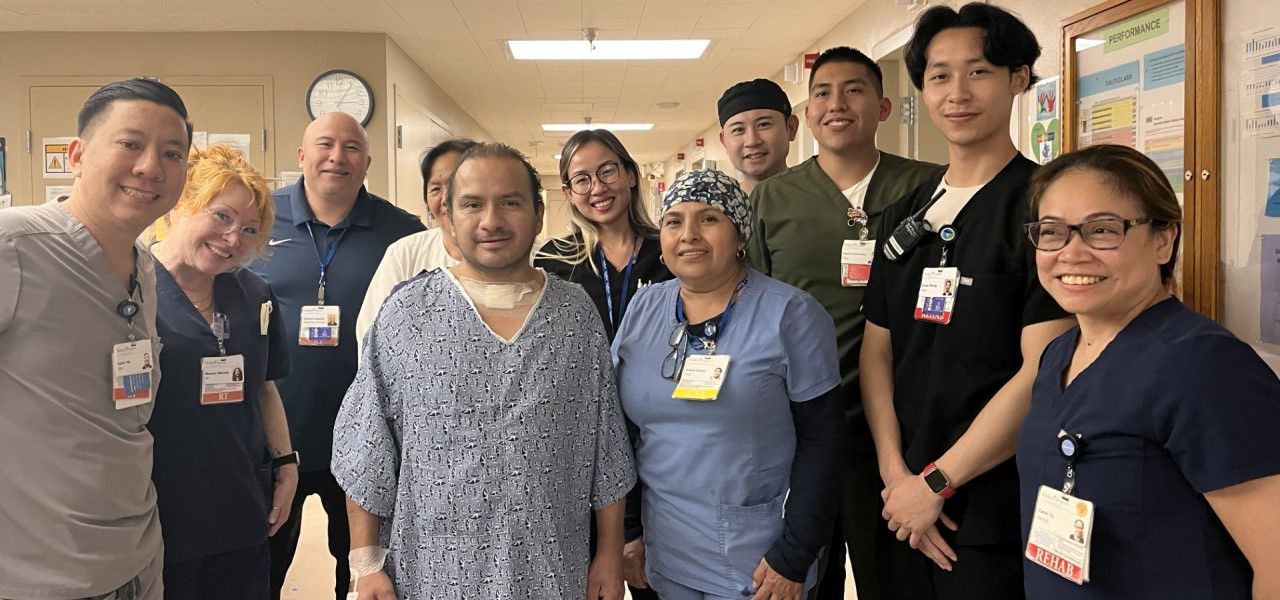 Kindred Hospital Westminster patient Miguel stands with his support team that helped him recover from pneumonia and respiratory failure