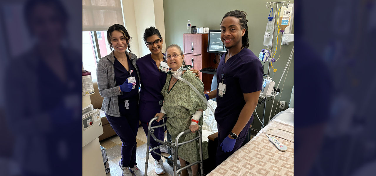 Happy patient leaving hospital with caregivers