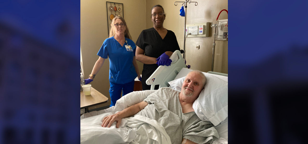 Kindred Hospital Chattanooga patient Randy poses with his care team