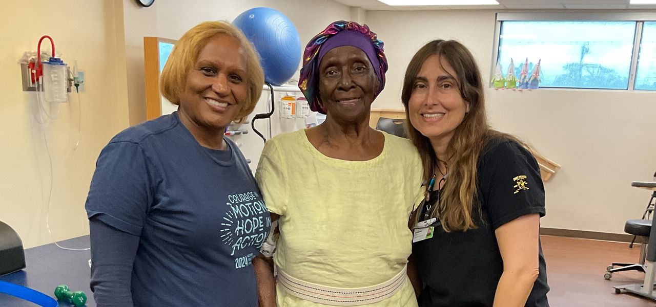 Kindred Hospital South Florida Ft Lauderdale patient Rebecca stands with her care team