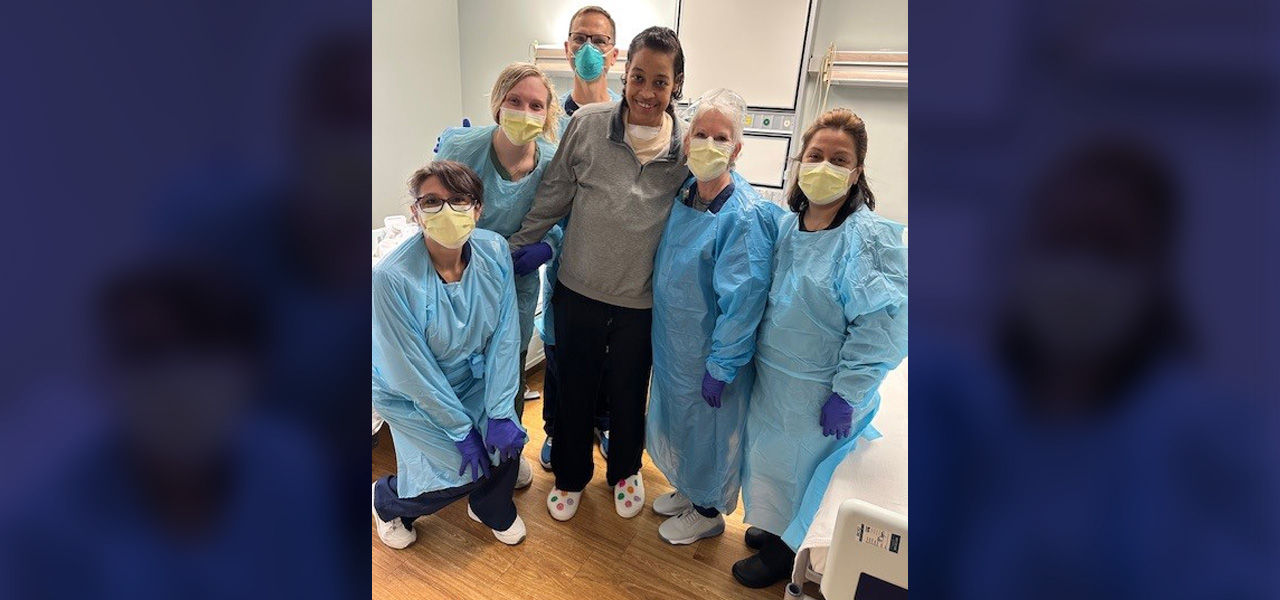 Kindred Hospital Fort Worth Southwest patient Renissa stands with her support team that helped her recover from brain injury