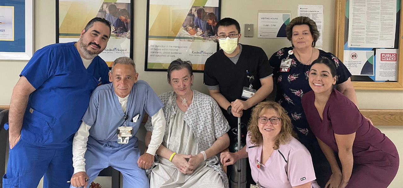 Kindred Hospital Morris County patient Richard poses with his care team