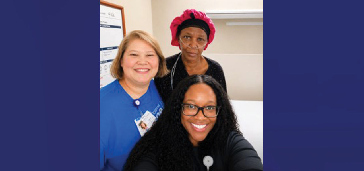 Kindred Hospital St. Louis South patient Sangabosamow poses with her care team. 
