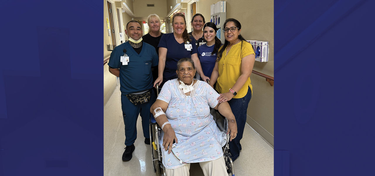 Kindred Hospital Albuquerque patient Tanveer poses with her caregiver team