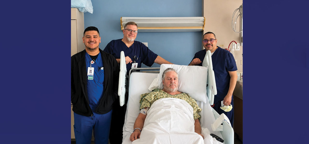 Kindred Hospital San Antonio patient Thomas poses with his care team