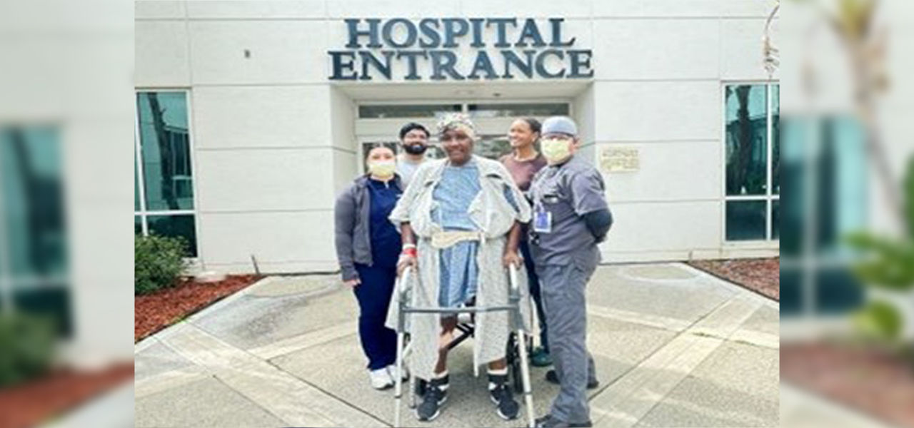 Happy patient leaving hospital with walker